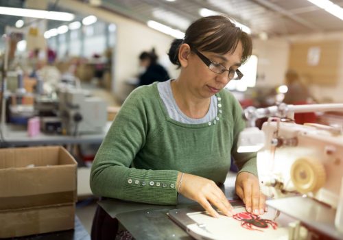 woman-working-in-textile-industry-E75P3FM